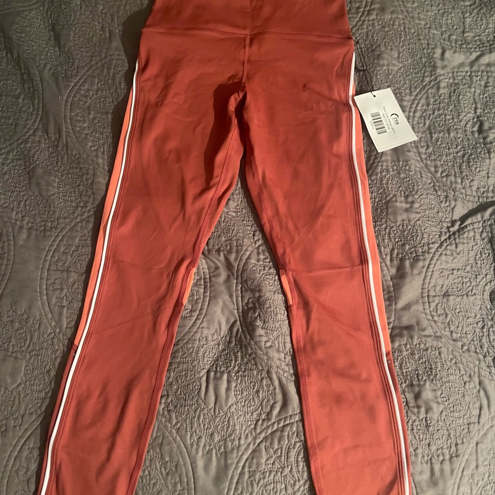 Women’s nwt Zyia  Terra Cotta piping light n tight 7/8 24”